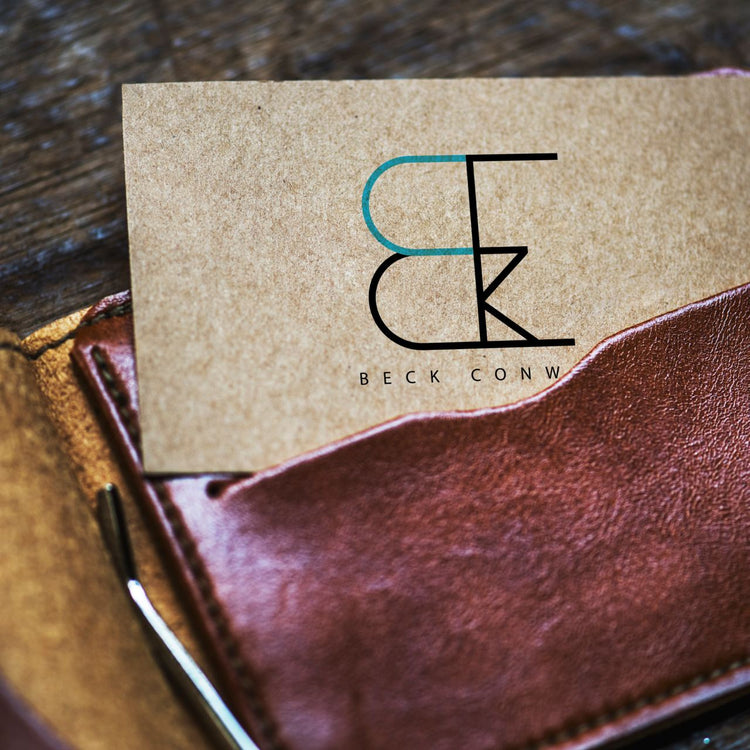 A minimalist business card with 'Beck Conw' logo.