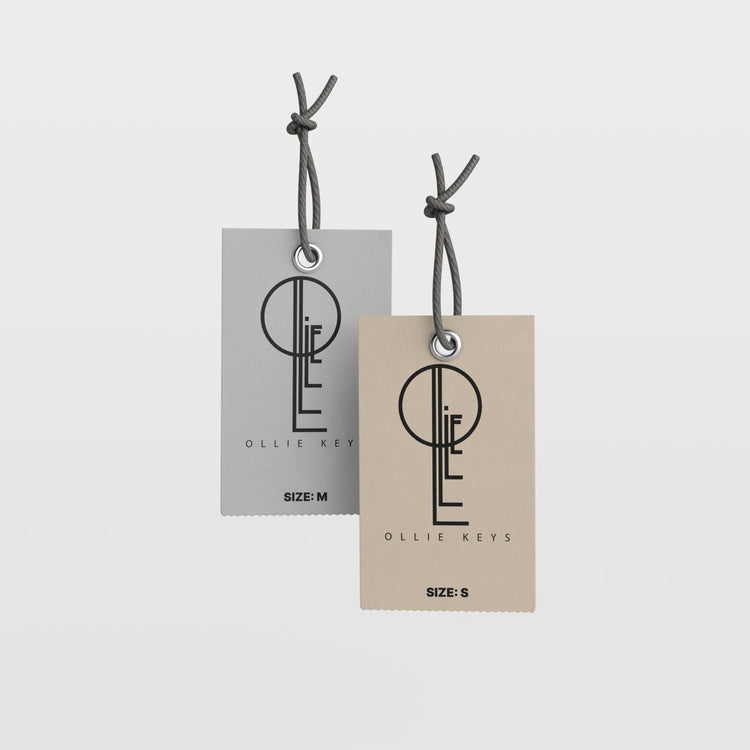 Two clothing tags with 'Ollie Keys' logo.